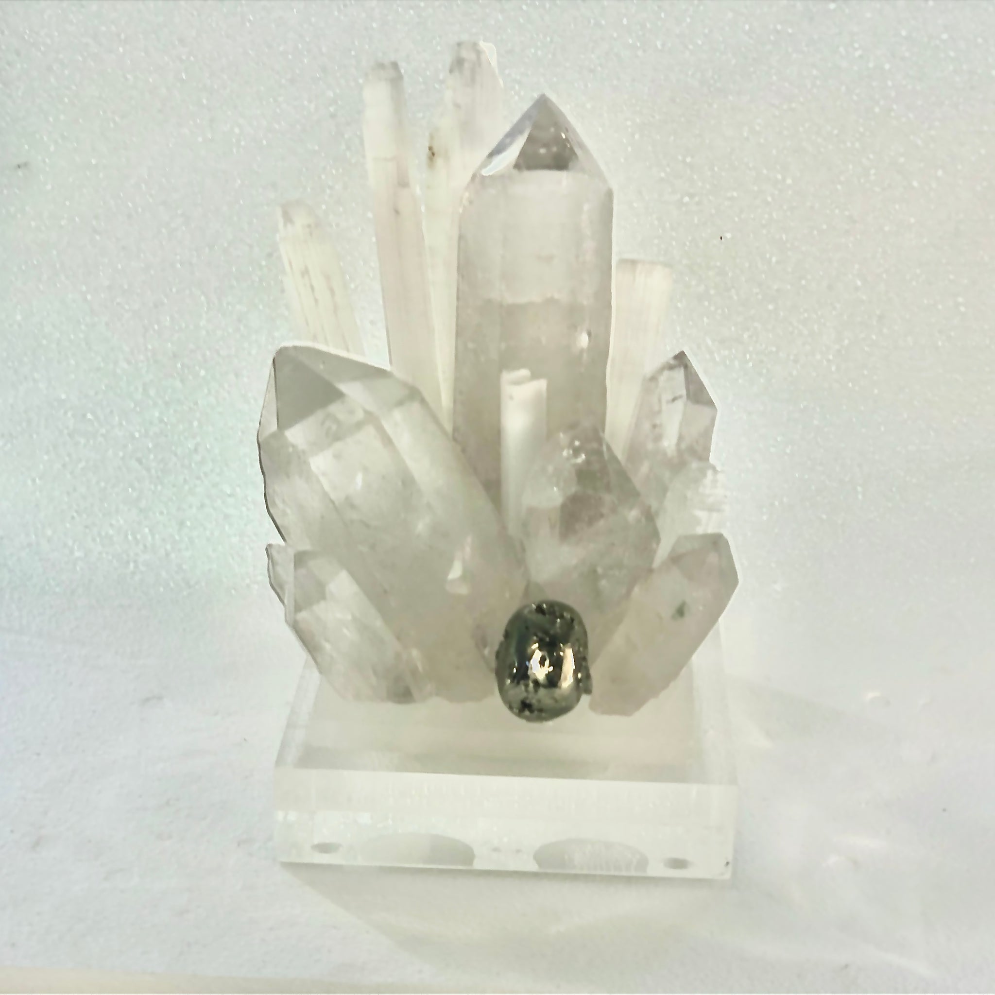 Pin outlet on crystals on watermark base